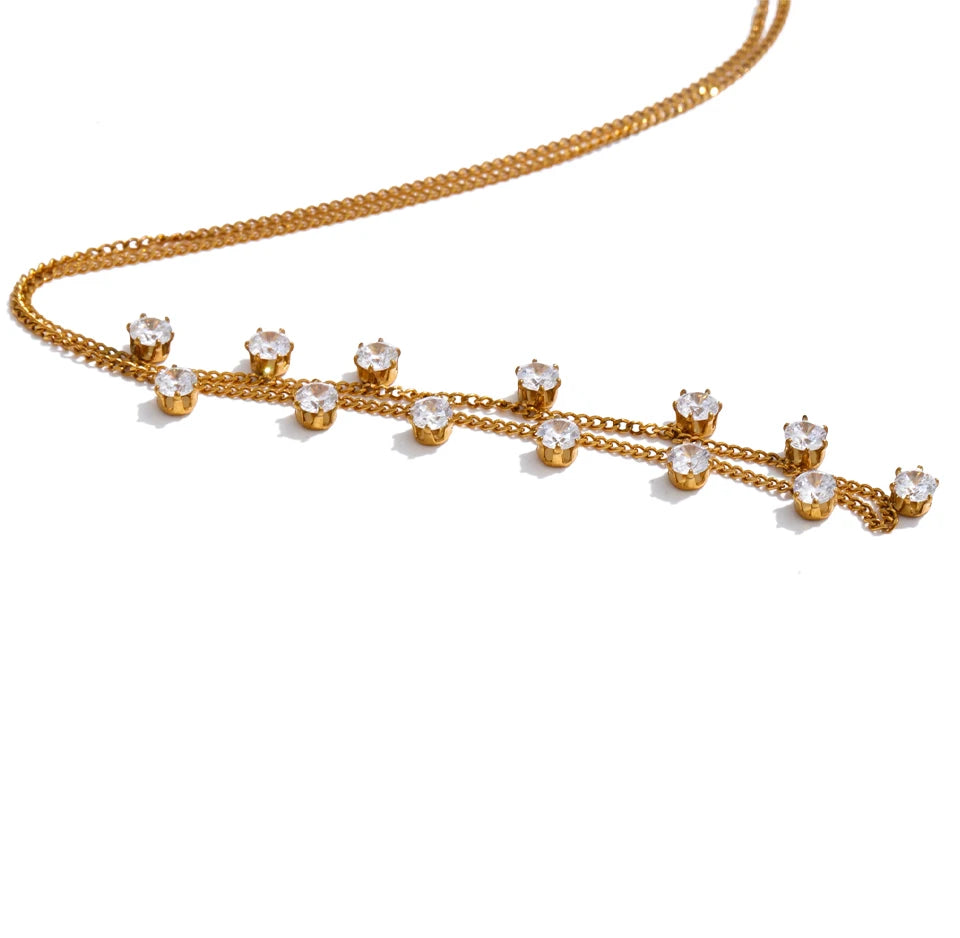 Cubic zirconia geometric necklace in gold-plated stainless steel with cubic zirconia.