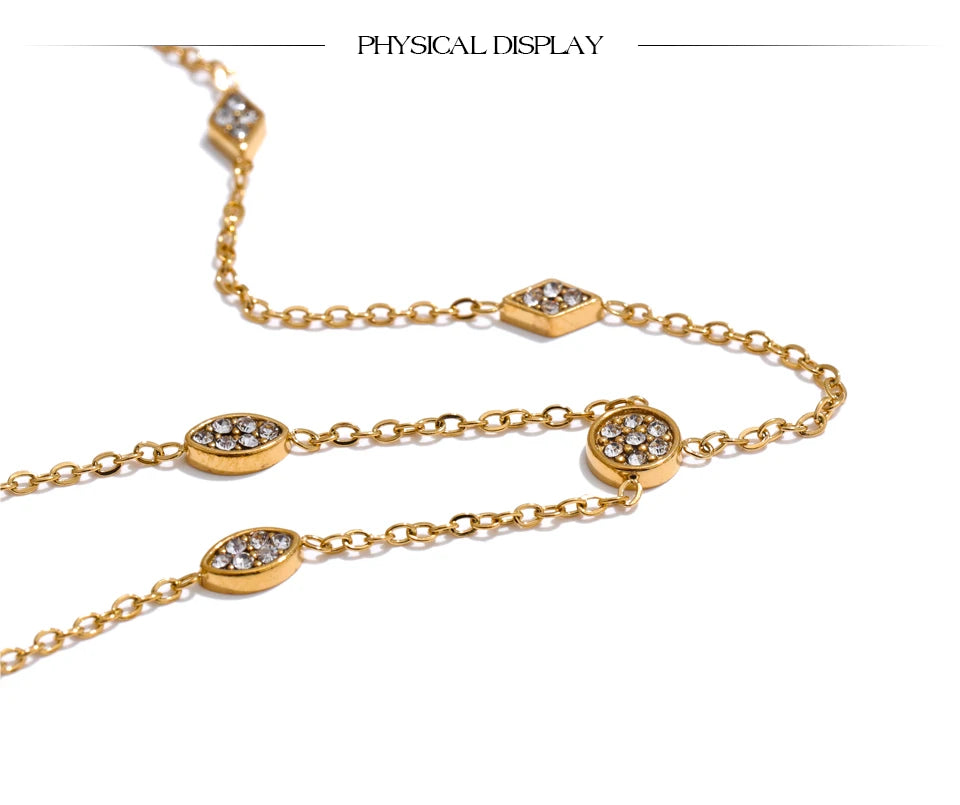 Cubic zirconia geometric chain necklace in gold-plated stainless steel with cubic zirconia.