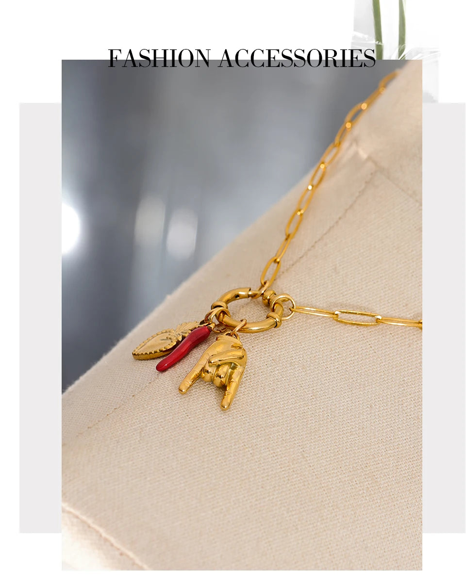 Red heart geometric necklace in gold-plated 316L stainless steel.