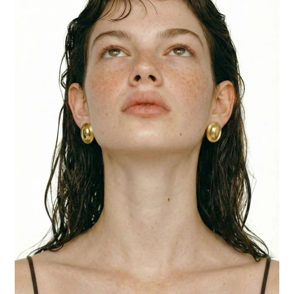 Geometric earrings in gold-plated stainless steel.