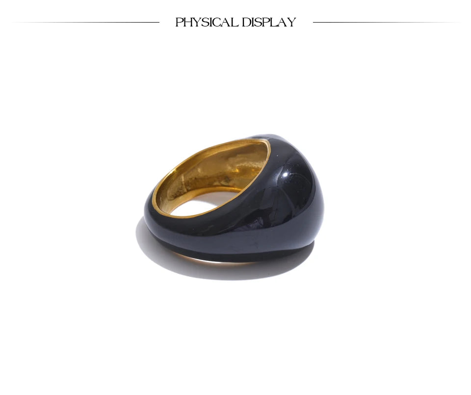 Black enamel geometric ring in gold-plated 316L stainless steel with enamel.