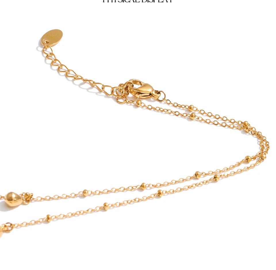 Geometric chain necklace in gold-plated stainless steel.