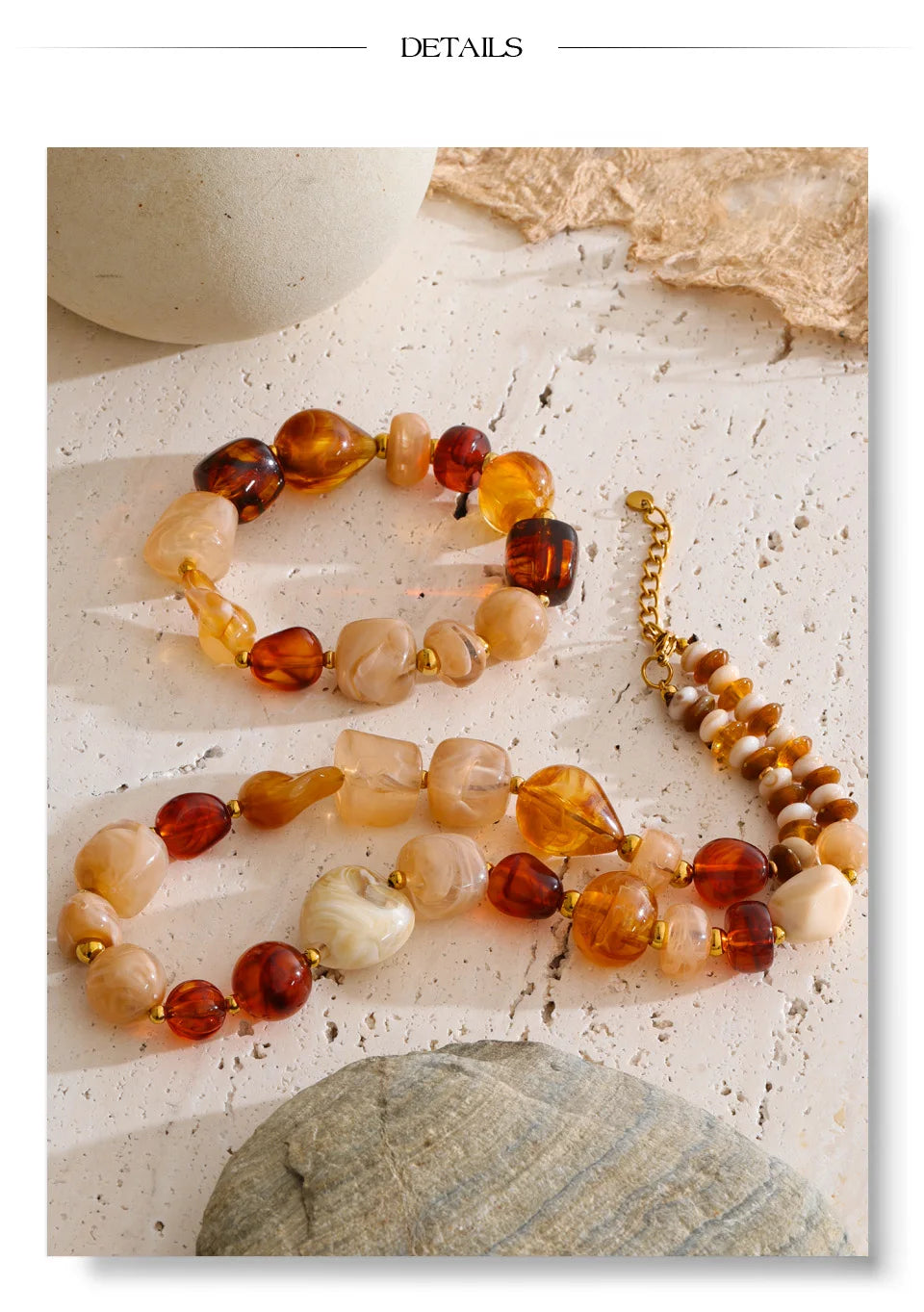 Resin acrylic beaded necklace in gold-plated stainless steel with resin and acrylic.