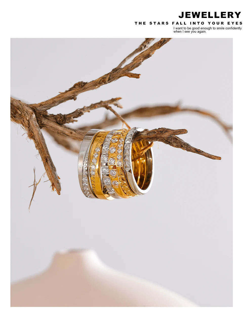 Cubic zirconia geometric ring in 18K gold-plated stainless steel with cubic zirconia.