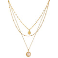 Coin hammered boho necklace in gold-plated stainless steel.