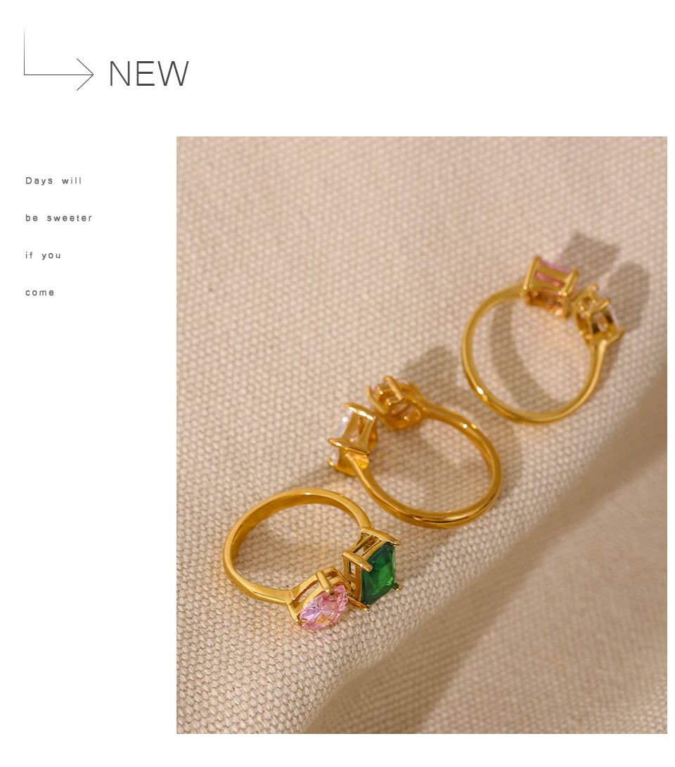 White cubic zirconia geometric ring in 18K gold-plated stainless steel with cubic zirconia.