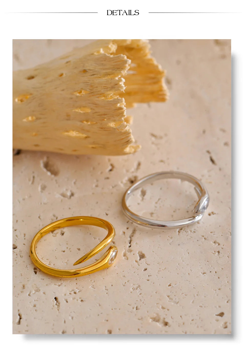 Cubic zirconia snake geometric ring in 18K gold-plated stainless steel with cubic zirconia.