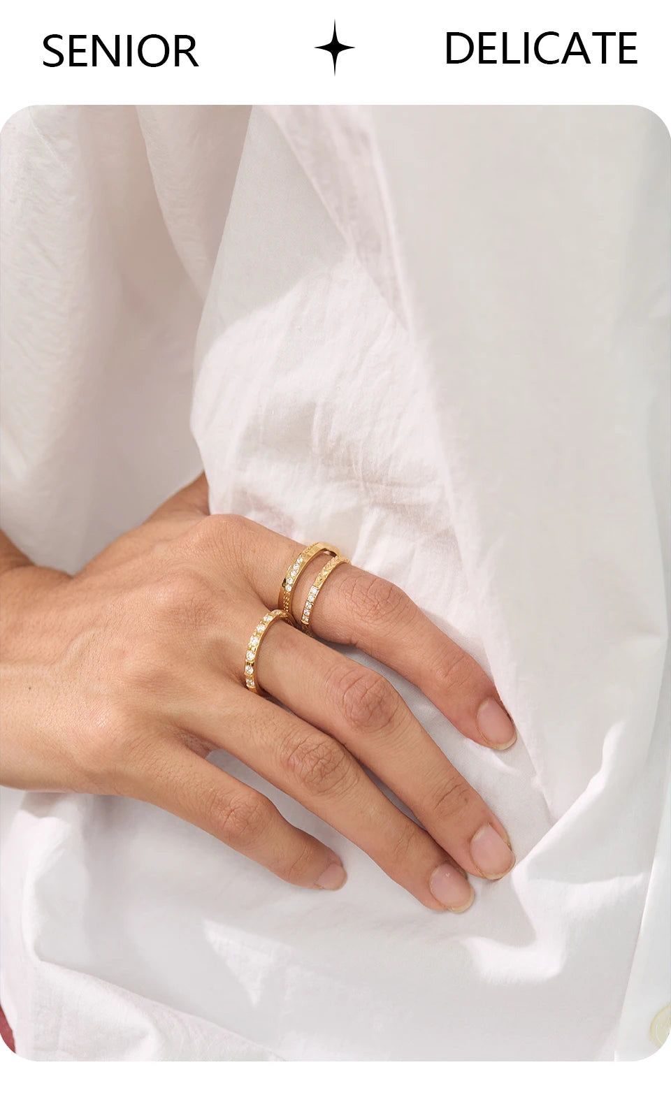 Cubic zirconia geometric ring in 18K gold-plated stainless steel with cubic zirconia.