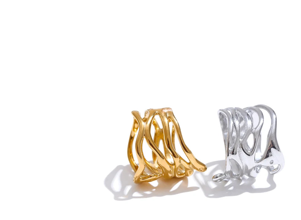 Geometric layered ring in gold-plated 316L stainless steel.