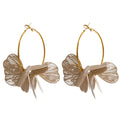 Flower earrings in gold-plated stainless steel.