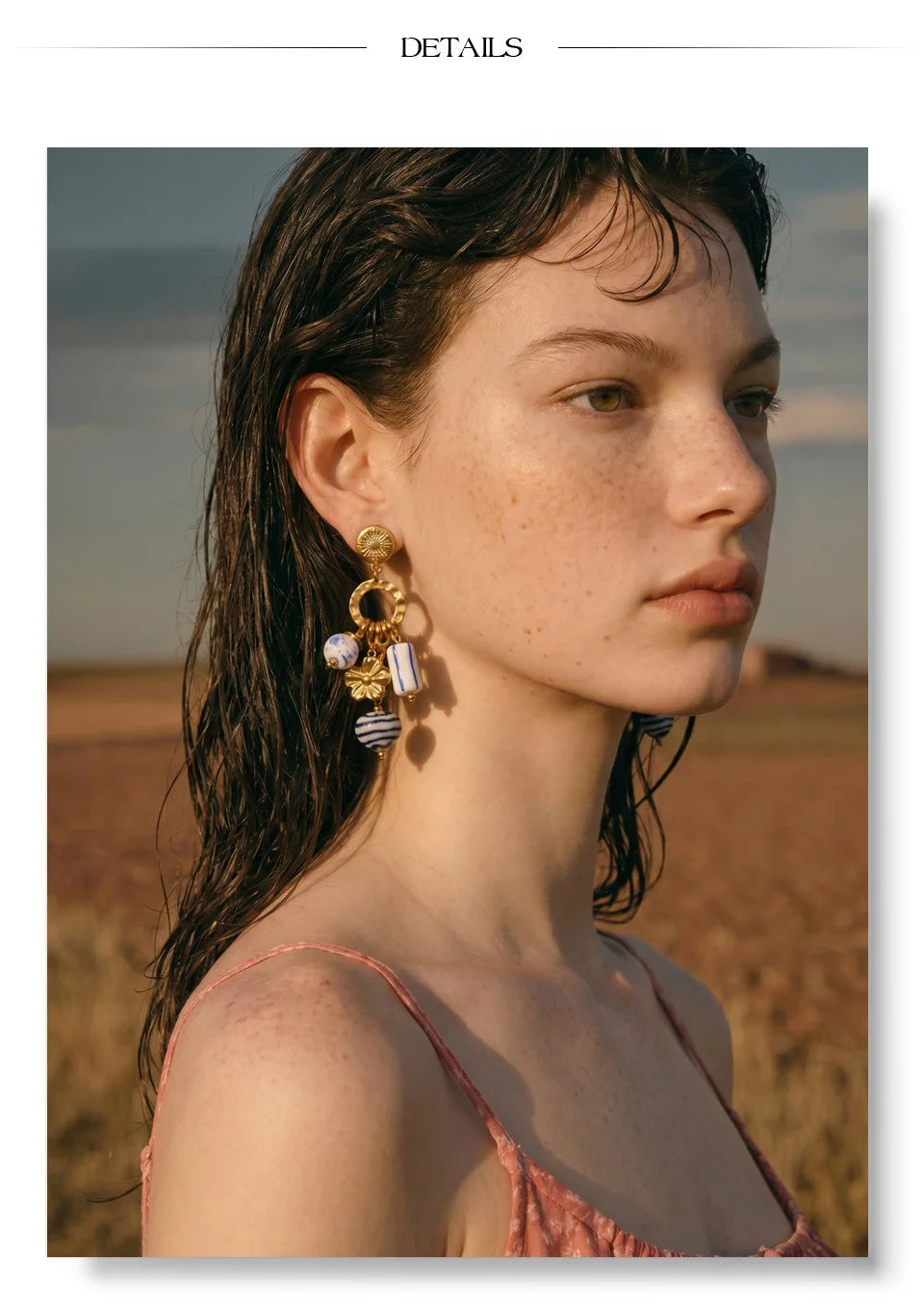 Blue heart flower earrings in gold-plated stainless steel.