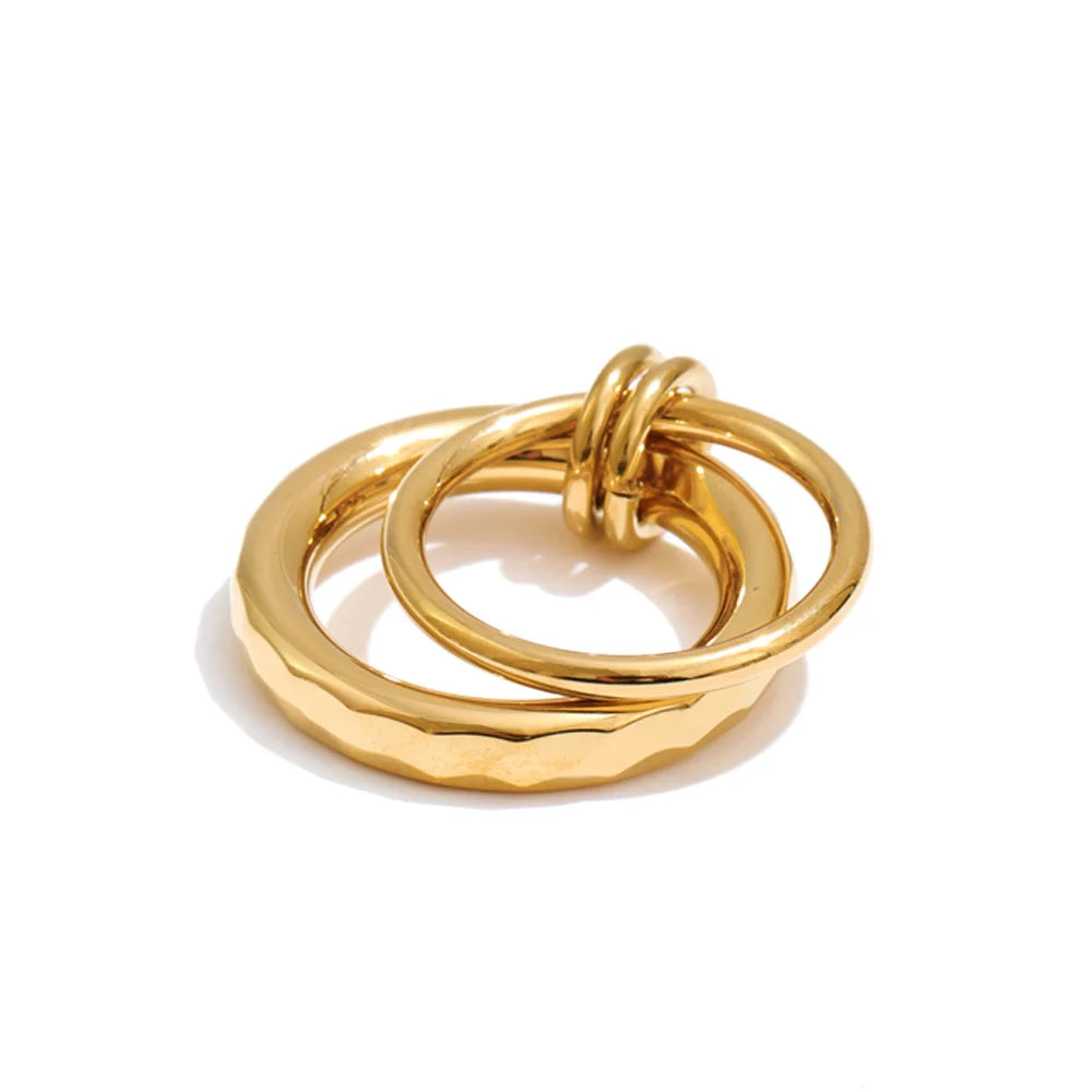 Geometric ring in 18K gold-plated stainless steel.