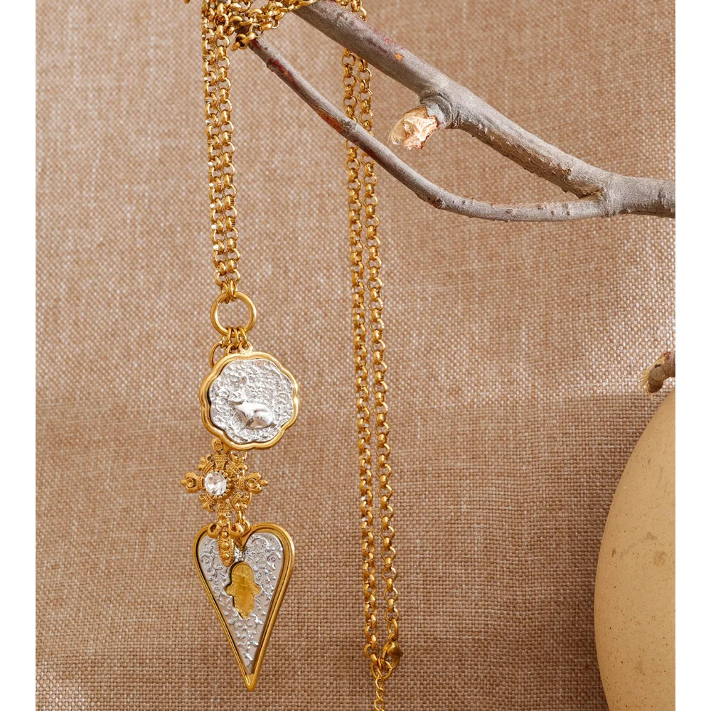 Heart cross necklace in gold-plated stainless steel.