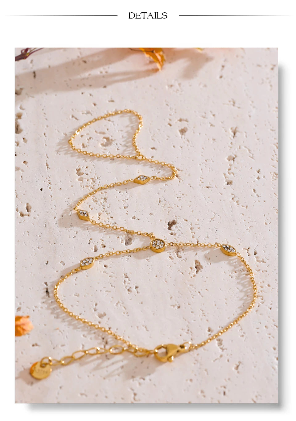 Cubic zirconia geometric chain necklace in gold-plated stainless steel with cubic zirconia.