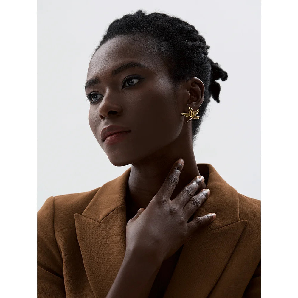 Star earrings in gold-plated 316L stainless steel.