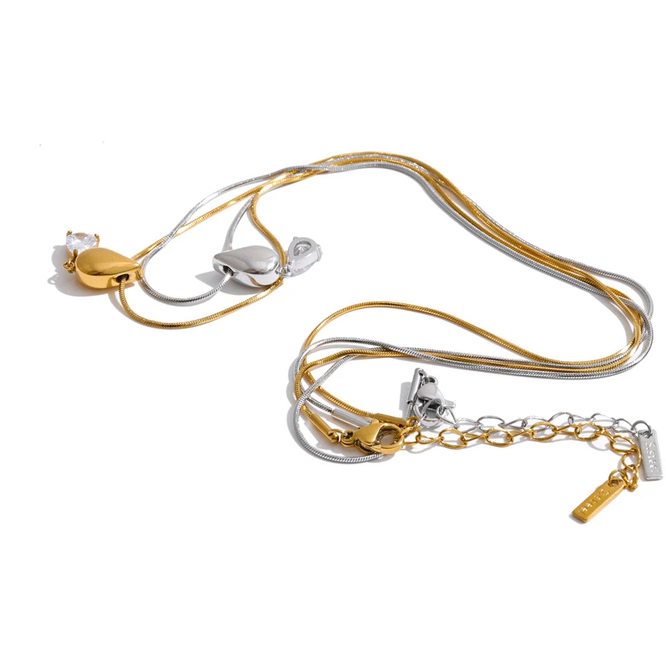 Cubic zirconia geometric necklace in gold-plated stainless steel with cubic zirconia.