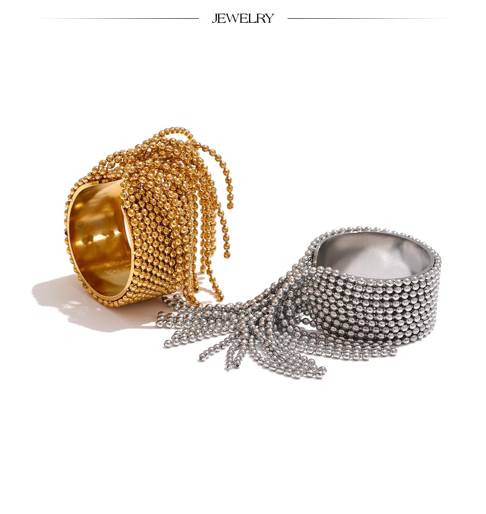 Geometric chain ring in 18K gold-plated stainless steel.