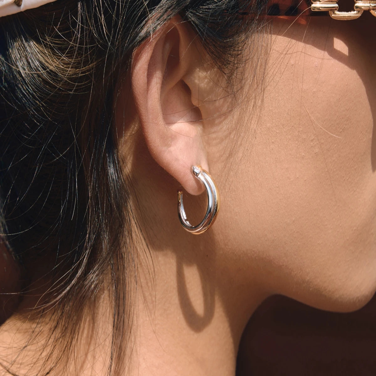 Two-Tone Twist Hoop Earrings — 18K Gold Plated · PA016
