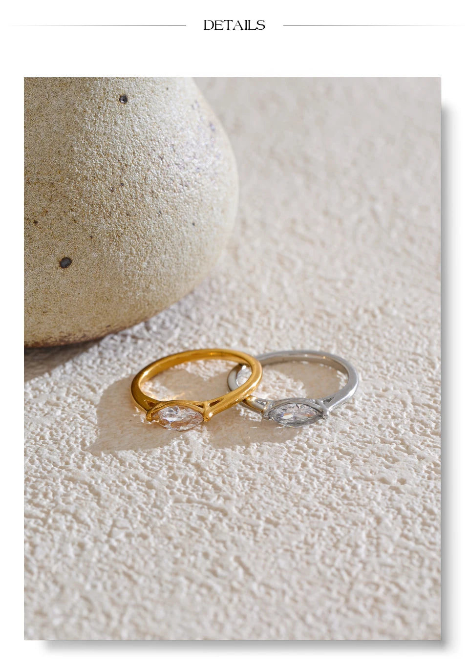 Cubic zirconia geometric ring in 18K gold-plated stainless steel with cubic zirconia.