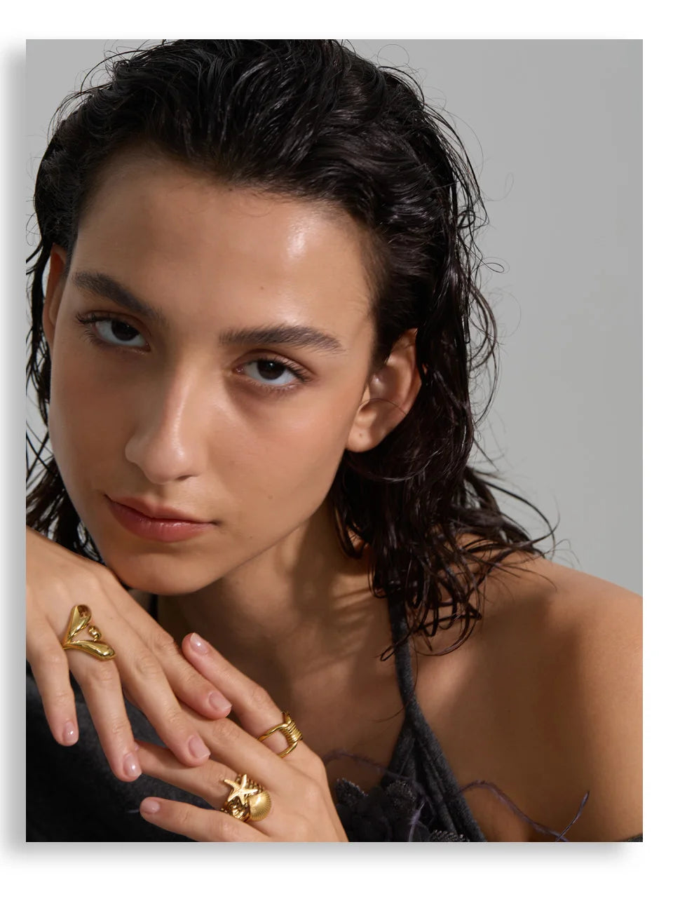 Geometric ring in gold-plated stainless steel.