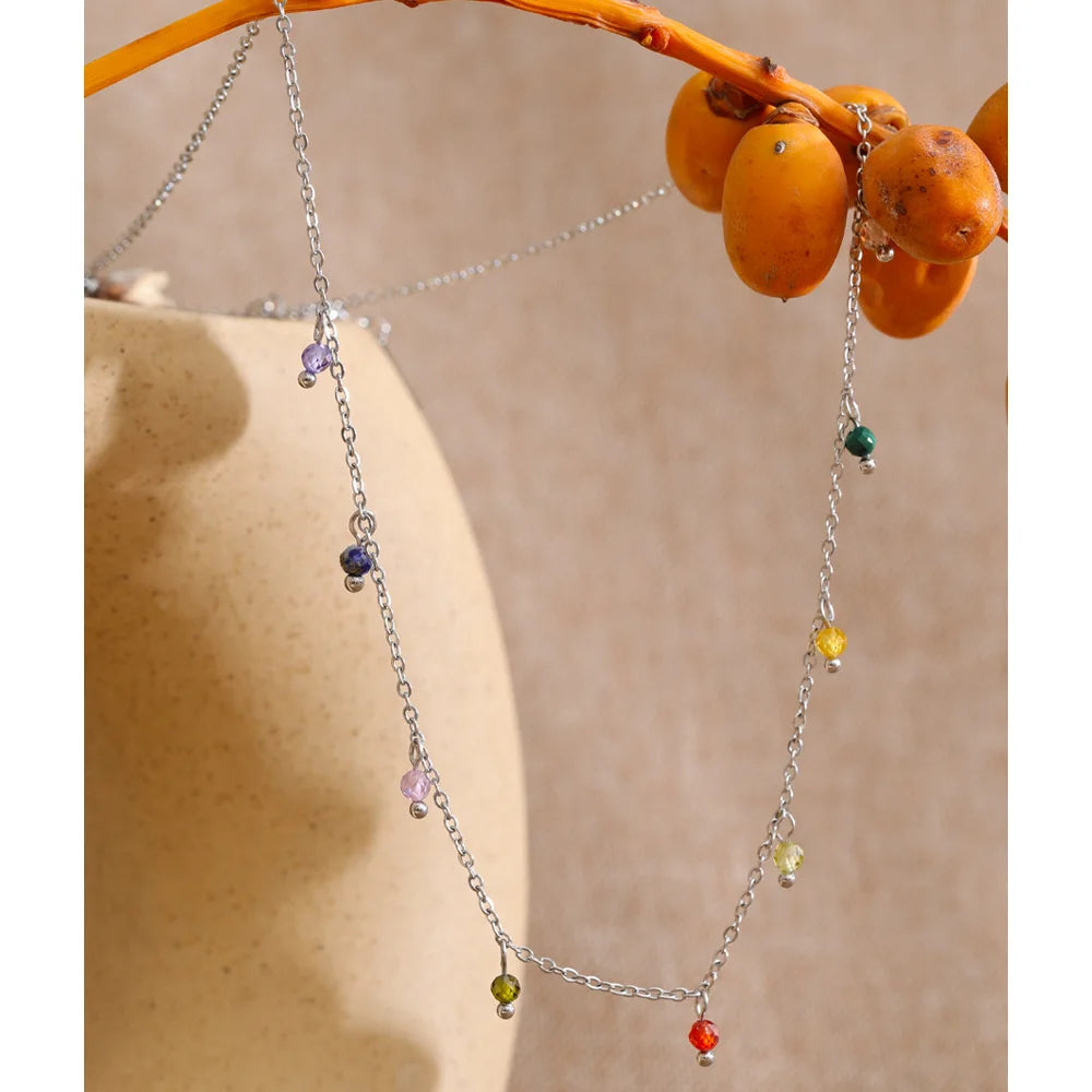 Cubic zirconia multi-color geometric necklace in gold-plated stainless steel with cubic zirconia.