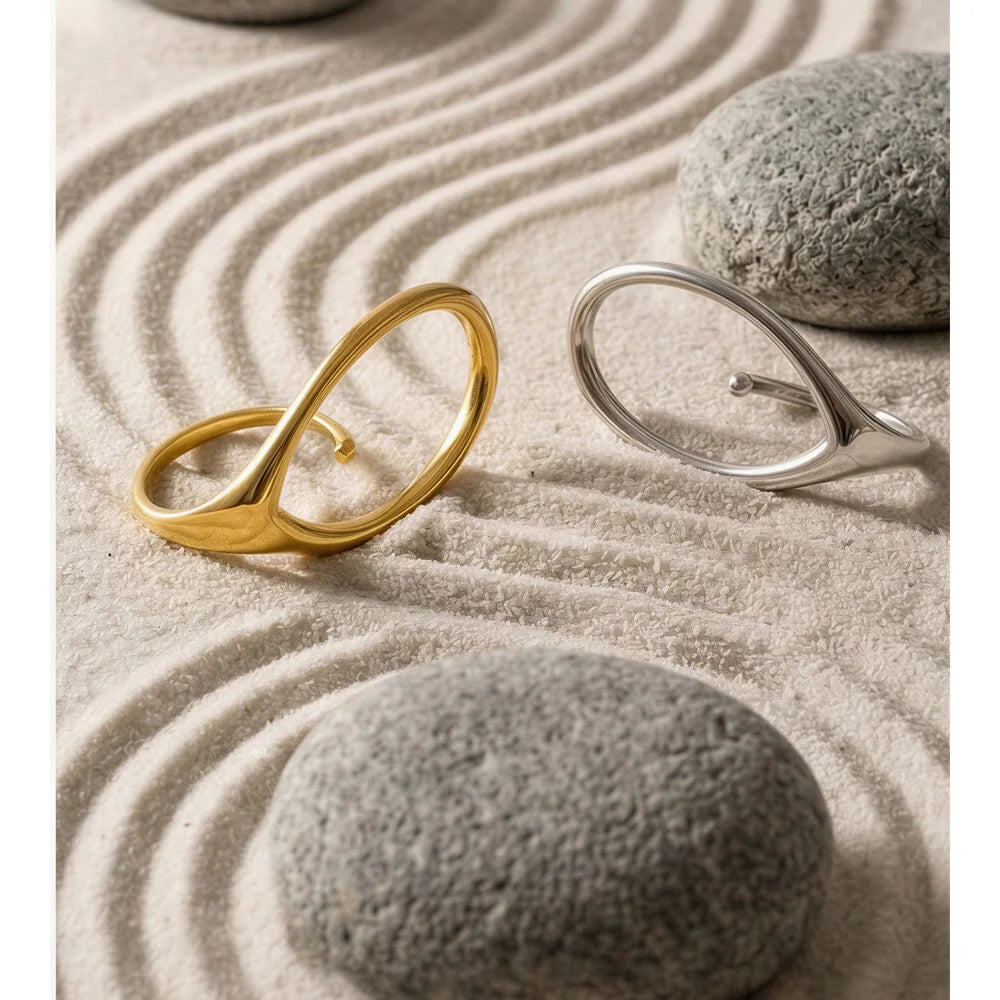 Geometric ring in 18K gold-plated stainless steel.