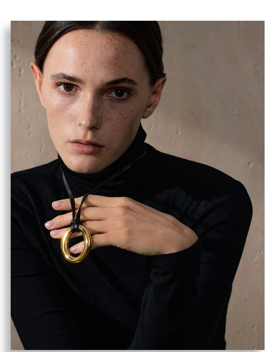 Coin geometric necklace in gold-plated stainless steel.
