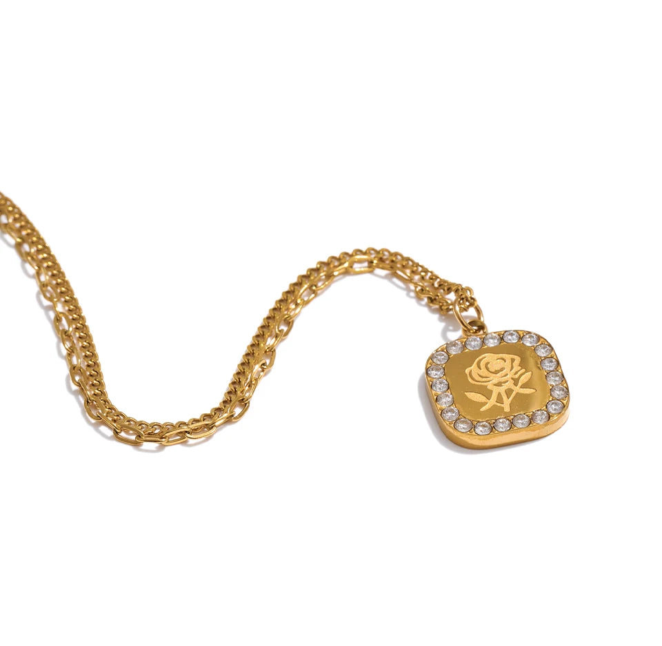 Cubic zirconia flower geometric necklace in gold-plated stainless steel with cubic zirconia.