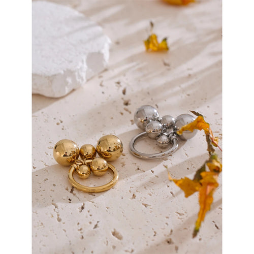 Beaded geometric ring in 18K gold-plated stainless steel.