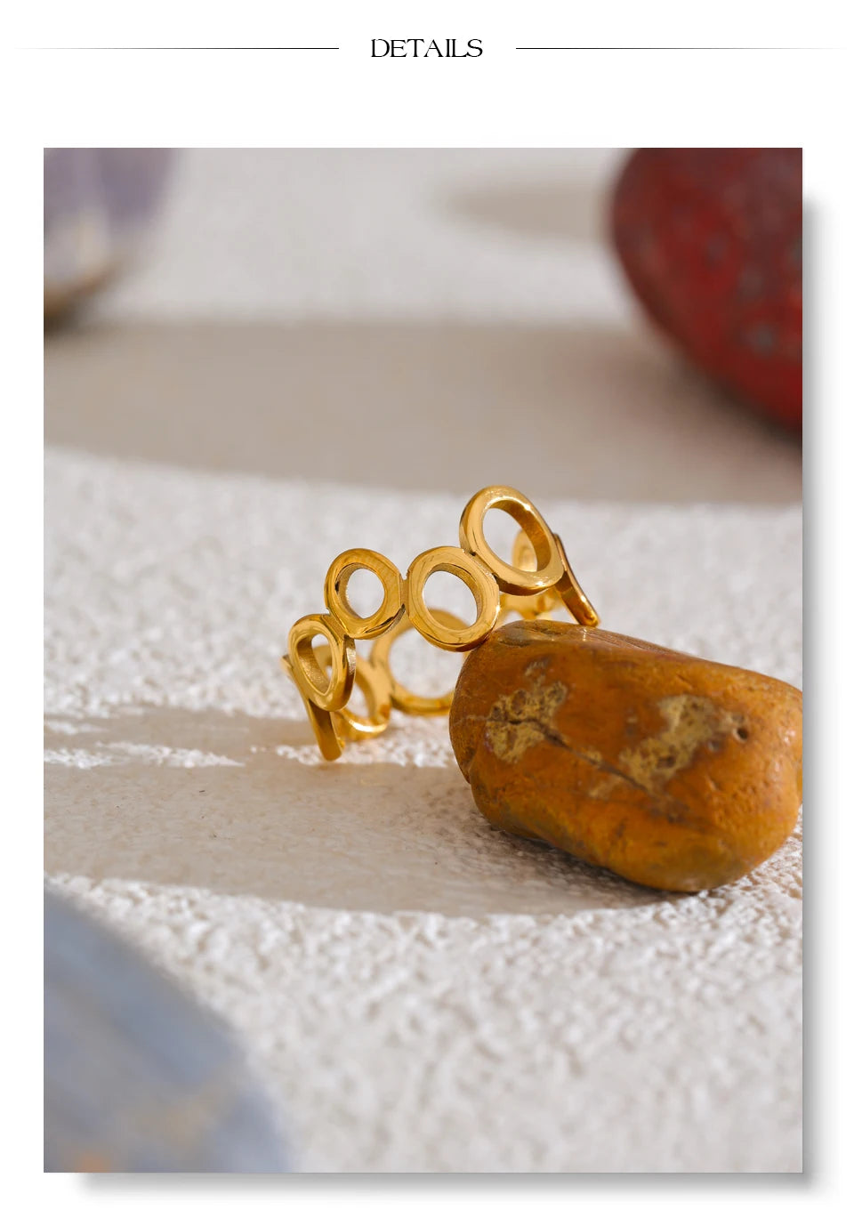 Geometric ring in 18K gold-plated stainless steel.
