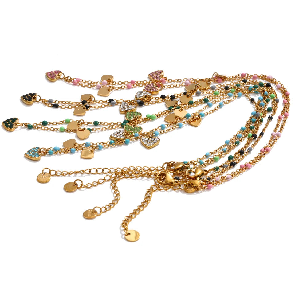 Crystal natural stone heart necklace in gold-plated stainless steel with natural stone and crystal.