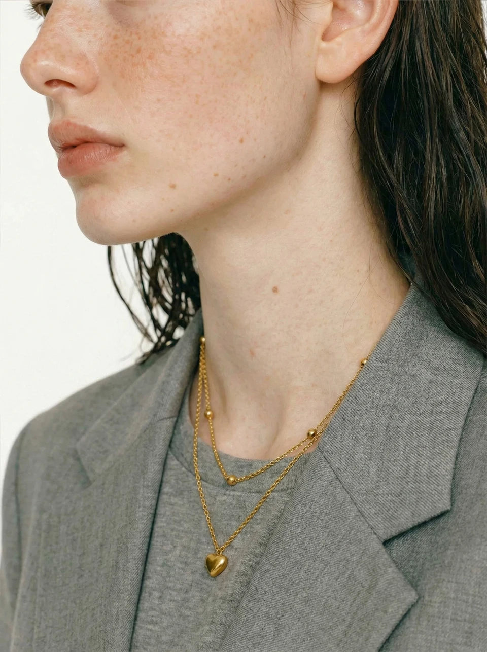 Heart chain necklace in gold-plated stainless steel.