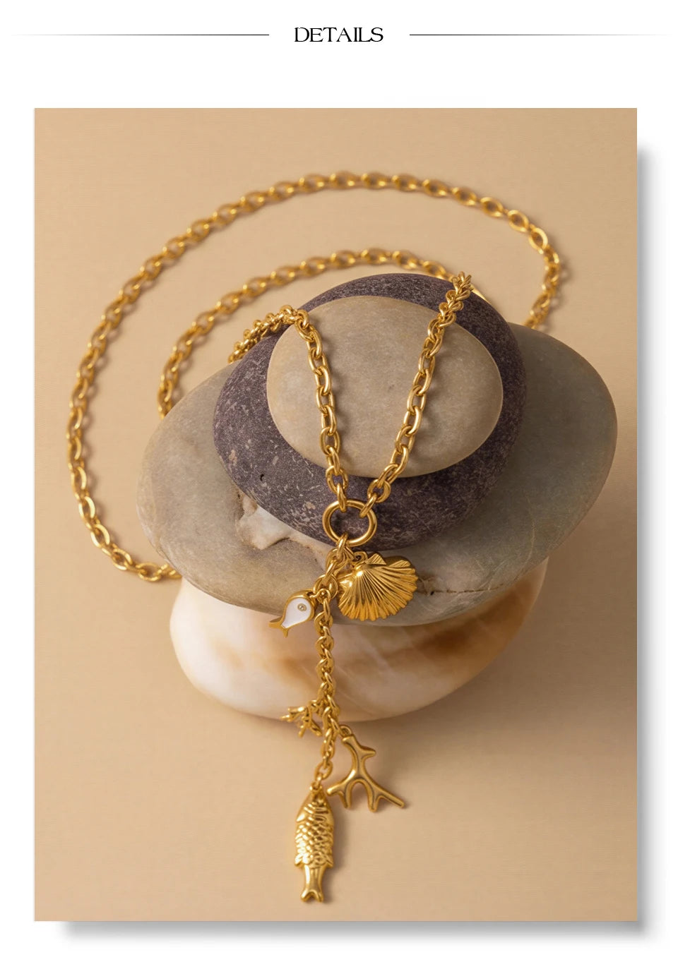 Cubic zirconia shell geometric necklace in gold-plated stainless steel with cubic zirconia and shell.