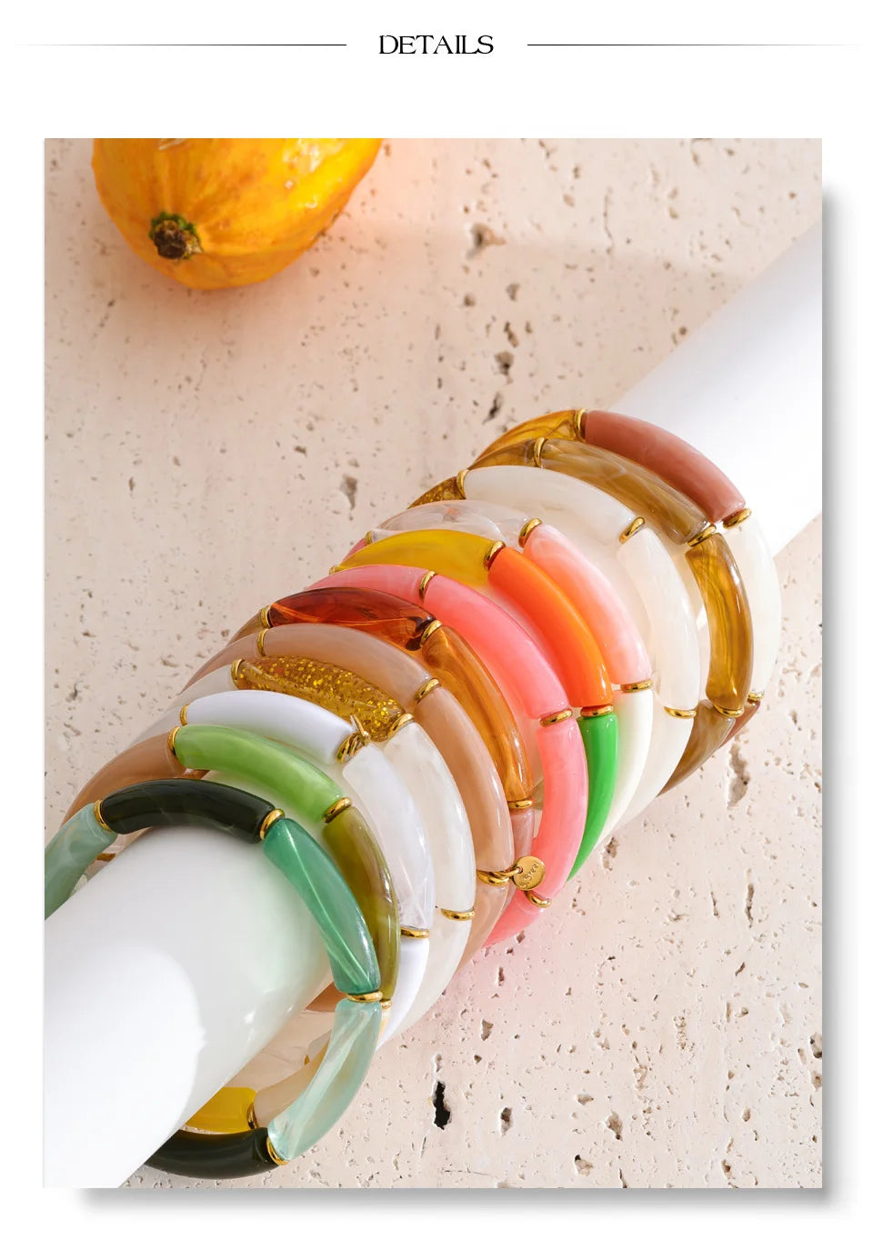 Resin acrylic geometric bracelet in gold-plated stainless steel with resin and acrylic.