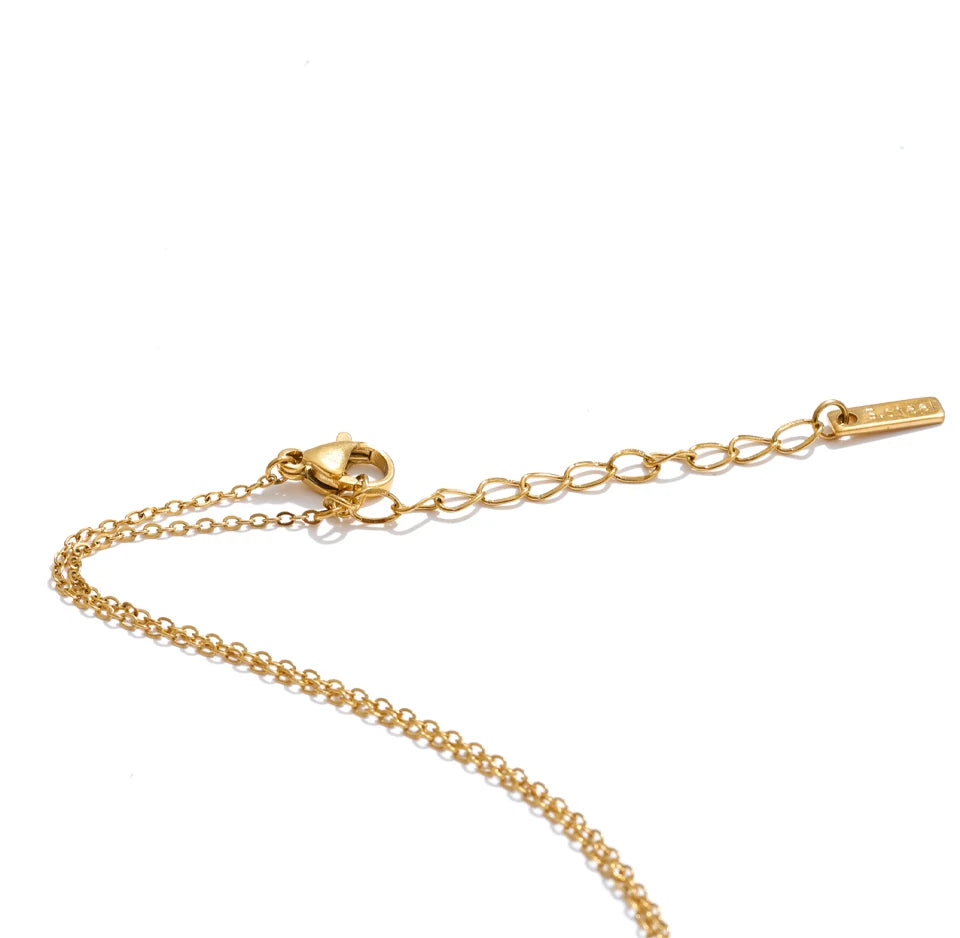 Cubic zirconia geometric chain necklace in gold-plated stainless steel with cubic zirconia.