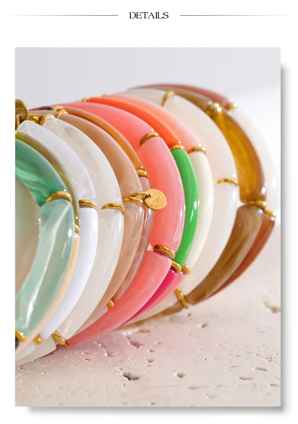Resin acrylic geometric bracelet in gold-plated stainless steel with resin and acrylic.