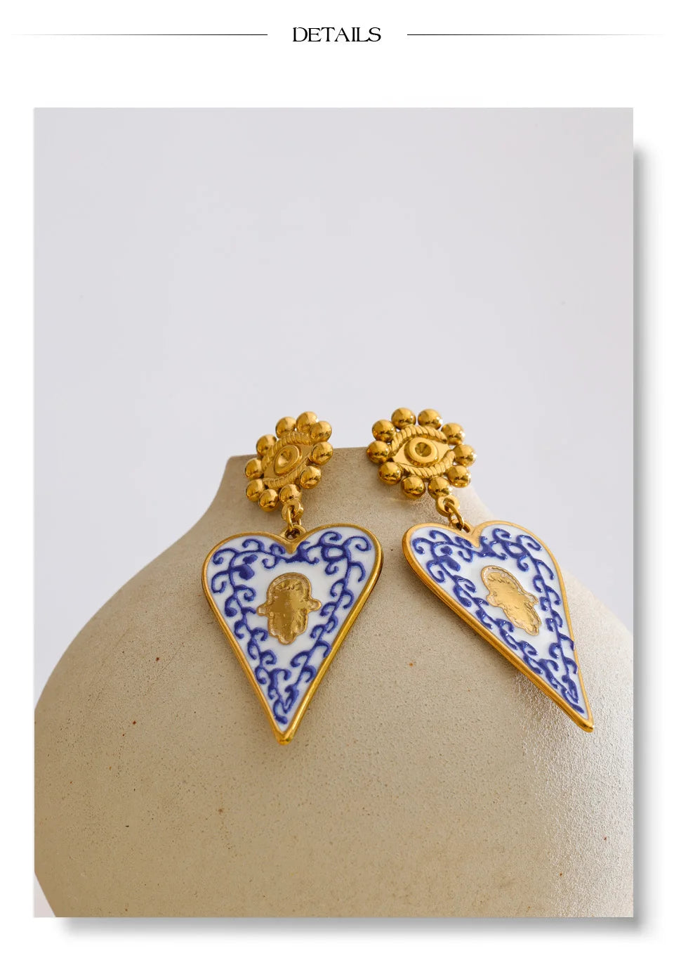 Blue enamel heart earrings in gold-plated stainless steel with enamel.