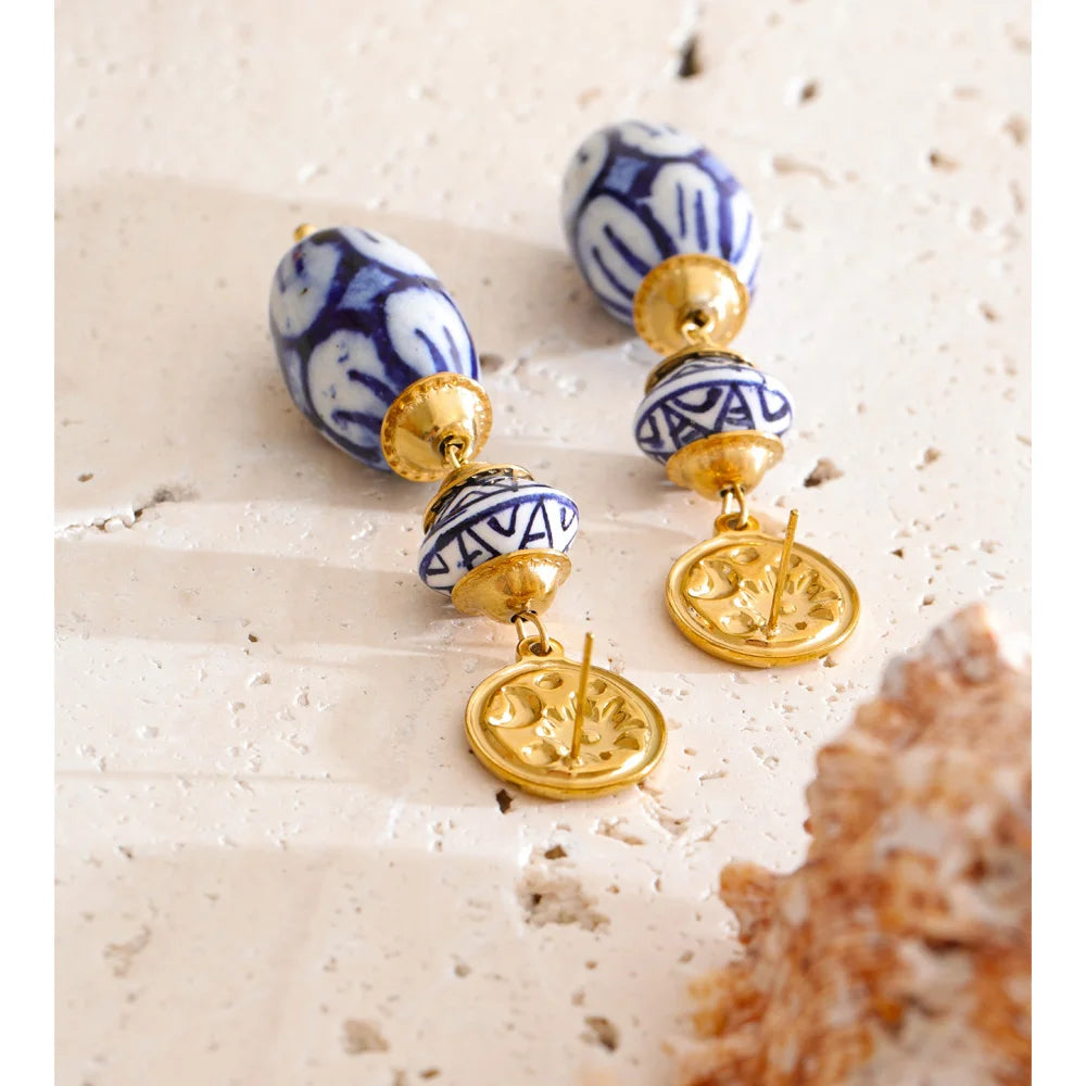Blue geometric earrings in gold-plated stainless steel.