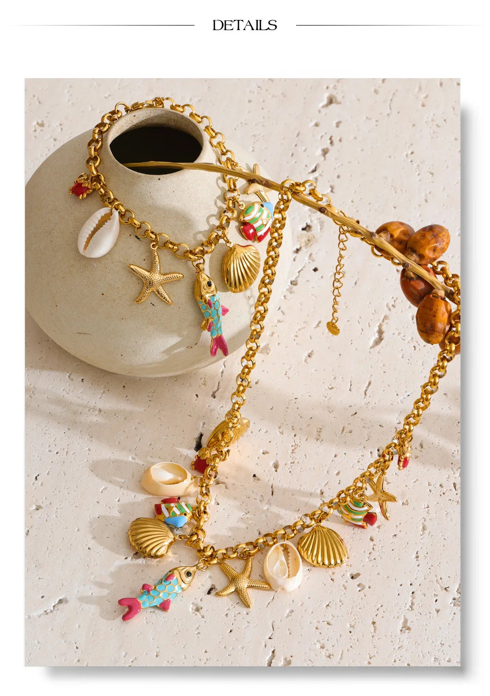 Shell enamel star necklace in gold-plated stainless steel with shell and enamel.