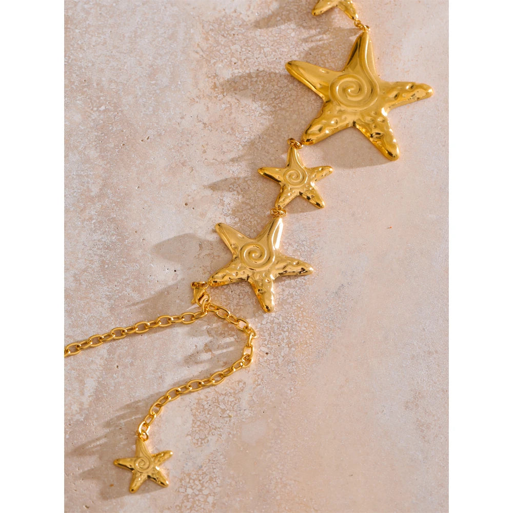 Star chain necklace in gold-plated stainless steel.