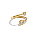 Cubic zirconia geometric ring in 18K gold-plated stainless steel with cubic zirconia.