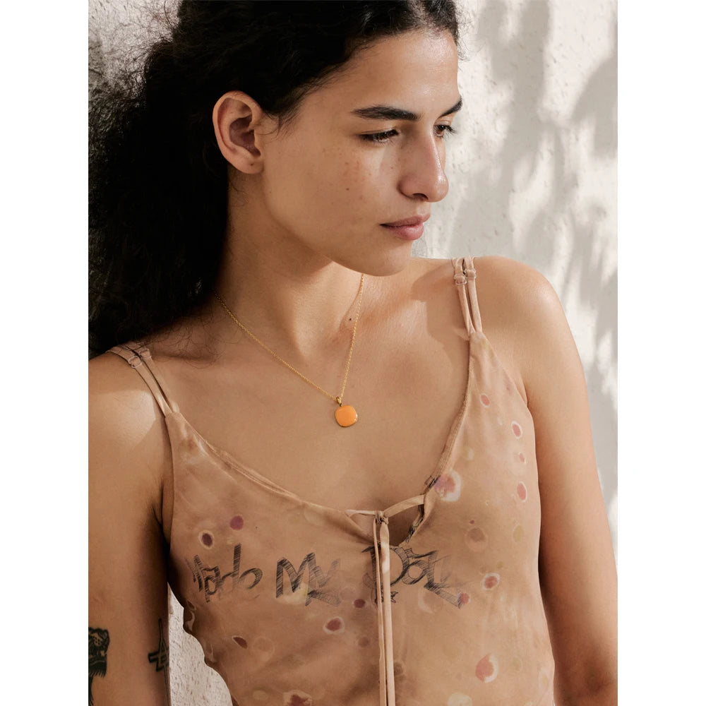 Geometric necklace in gold-plated stainless steel.