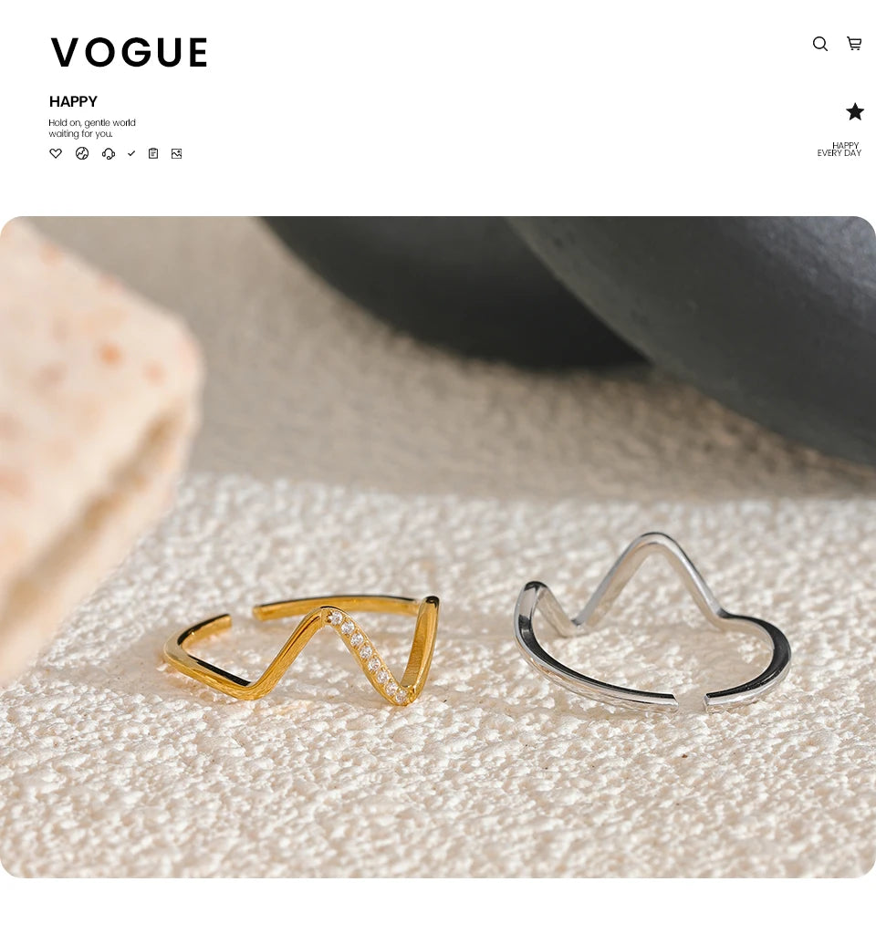 Cubic zirconia geometric ring in 18K gold-plated stainless steel with cubic zirconia.