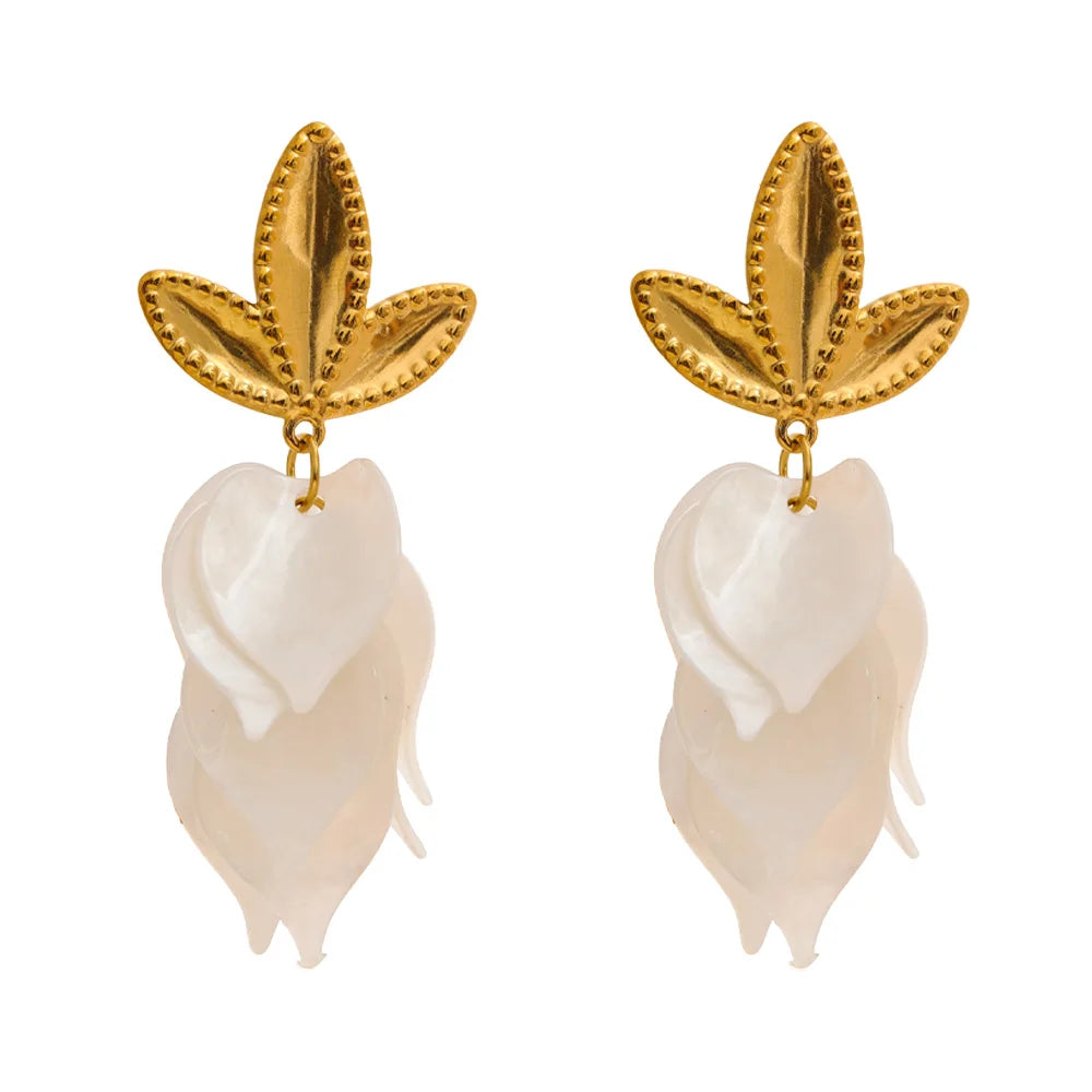 White resin acrylic earrings in gold-plated stainless steel with resin and acrylic.