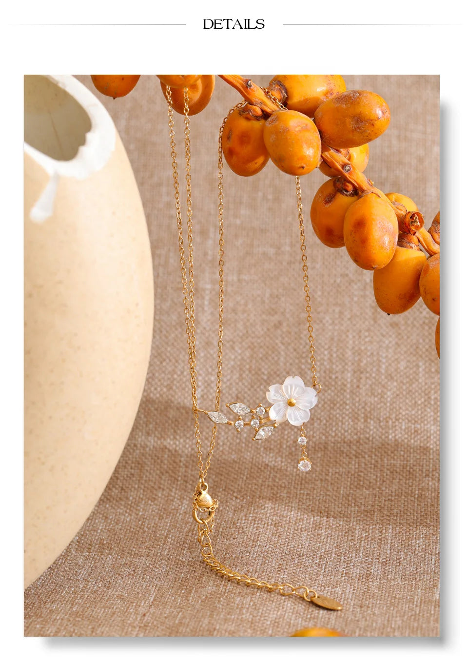 Cubic zirconia shell flower necklace in gold-plated stainless steel with cubic zirconia and shell.