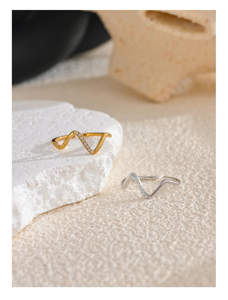 Cubic zirconia geometric ring in 18K gold-plated stainless steel with cubic zirconia.