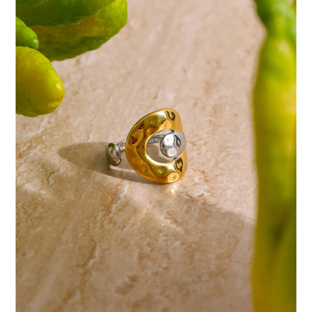 Geometric ring in 18K gold-plated stainless steel.