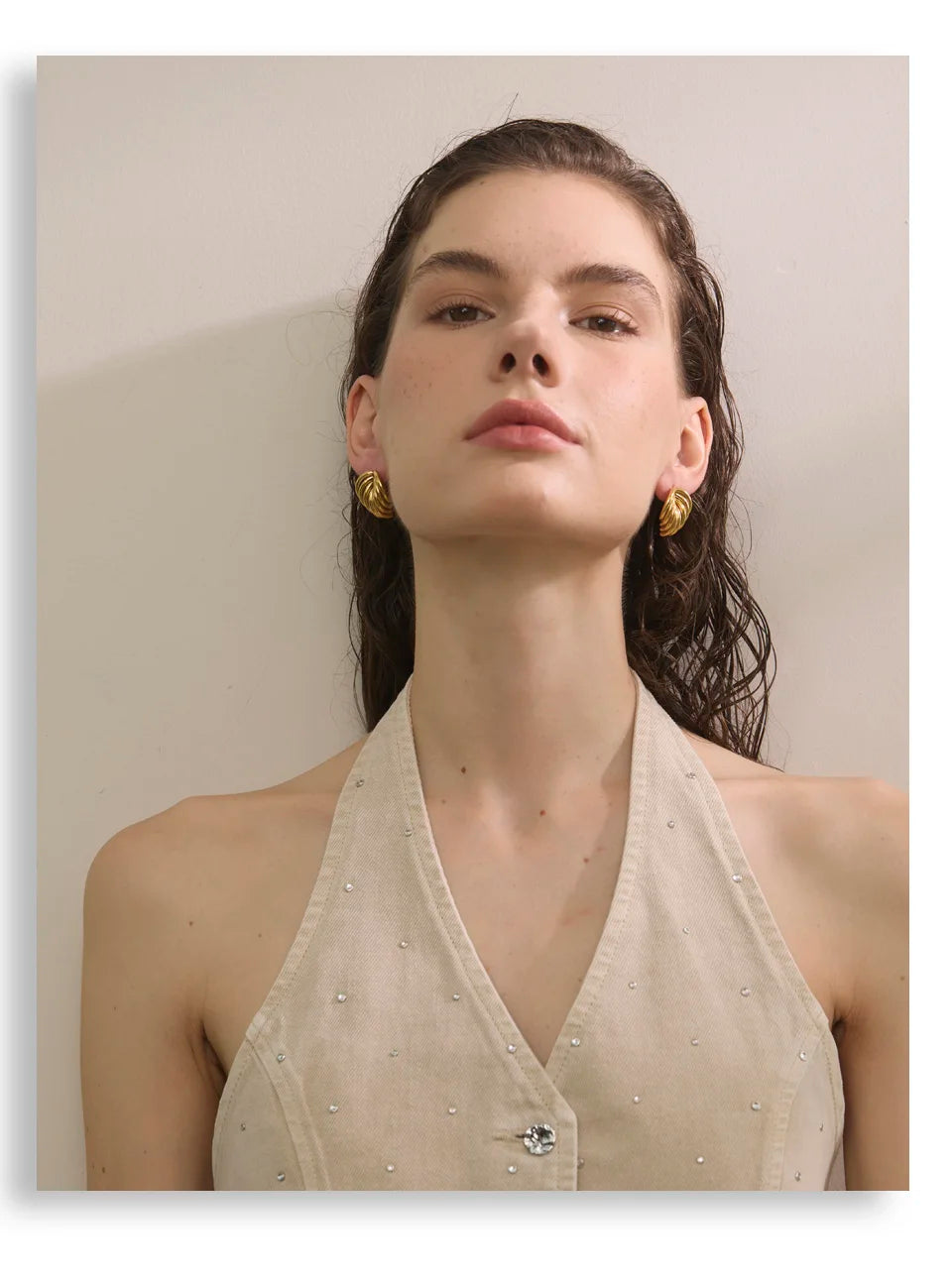 Geometric earrings in gold-plated stainless steel.
