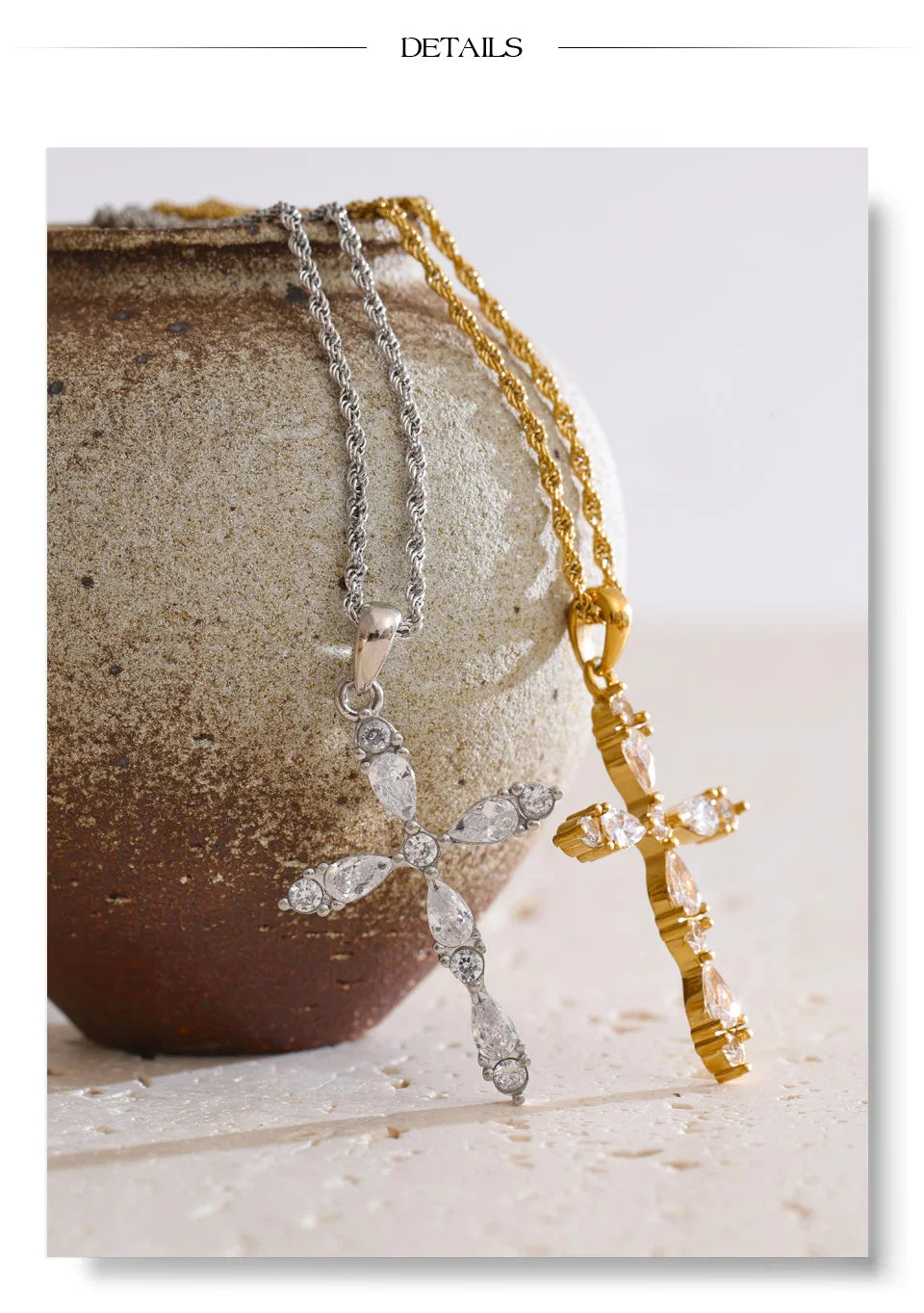 Cubic zirconia cross necklace in gold-plated stainless steel with cubic zirconia.