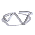 Cubic zirconia geometric ring in 18K gold-plated stainless steel with cubic zirconia.